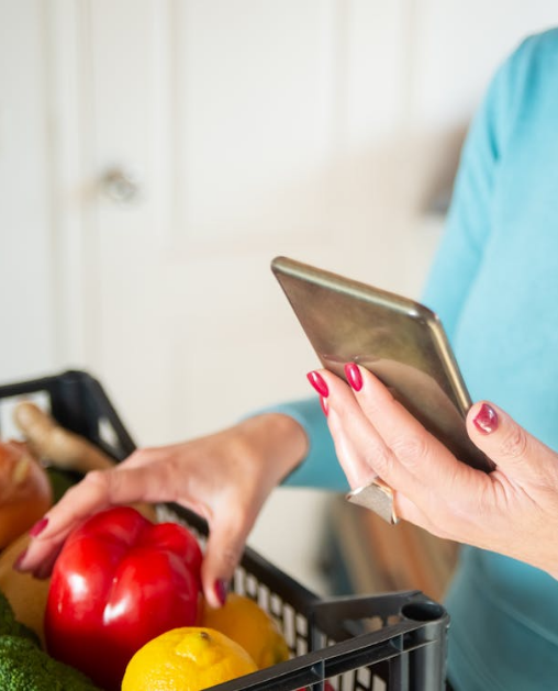 Women picking fruit-vegetable form the basket